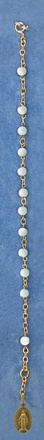 DIZAINIER PLAQUE OR NACRE RONDE ET MEDAILLE MIRACULEUSE